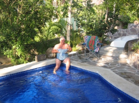 Fat nan Girdle Goddess goes for a skinny dip in a backyard pool