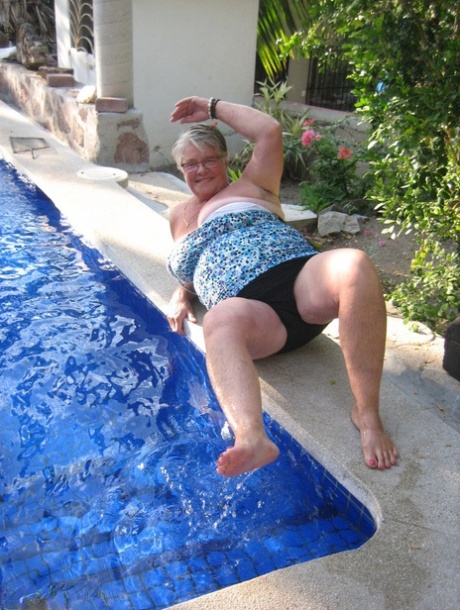 Fat nan Girdle Goddess goes for a skinny dip in a backyard pool
