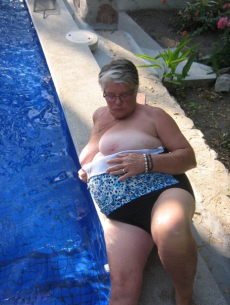 Fat nan Girdle Goddess goes for a skinny dip in a backyard pool