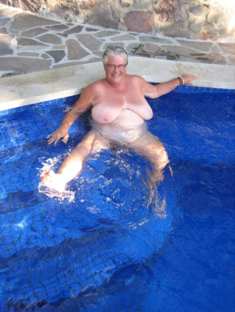 Fat nan Girdle Goddess goes for a skinny dip in a backyard pool