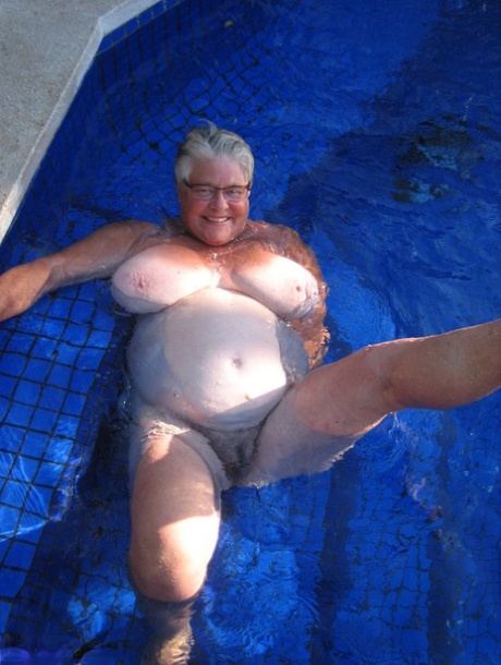Fat nan Girdle Goddess goes for a skinny dip in a backyard pool