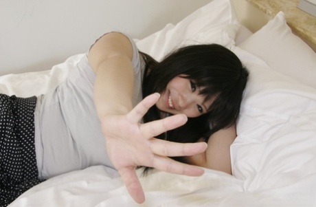 Japanese girl Momoka Matsumoto flashes her bush after exposing her big tits