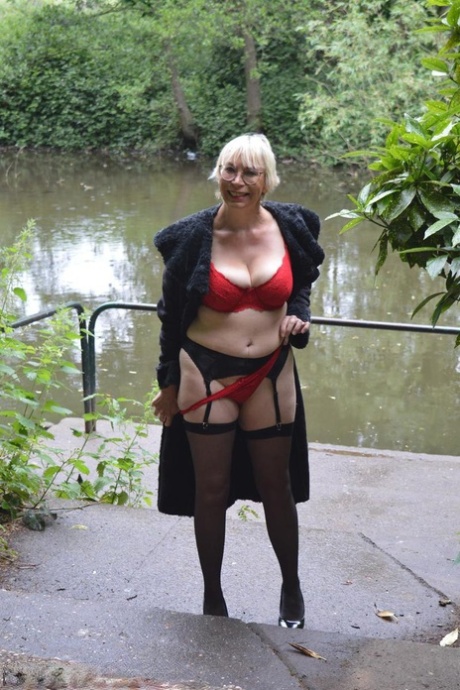 Older blonde amateur Barby Slut flashes while out in public places