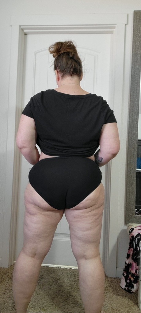 Fat amateur Busty Kris Ann strips completely naked on carpeted flooring