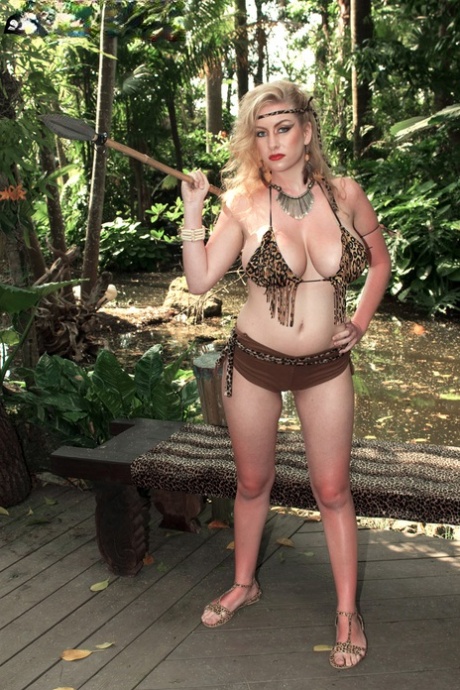 Blonde spear chucker Kali West lets her male captive suckle on her big boobs