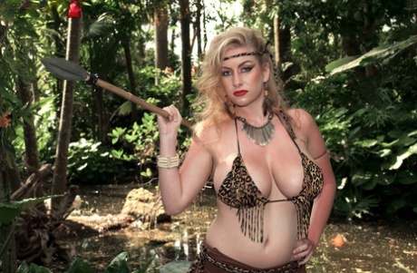 Blonde spear chucker Kali West lets her male captive suckle on her big boobs