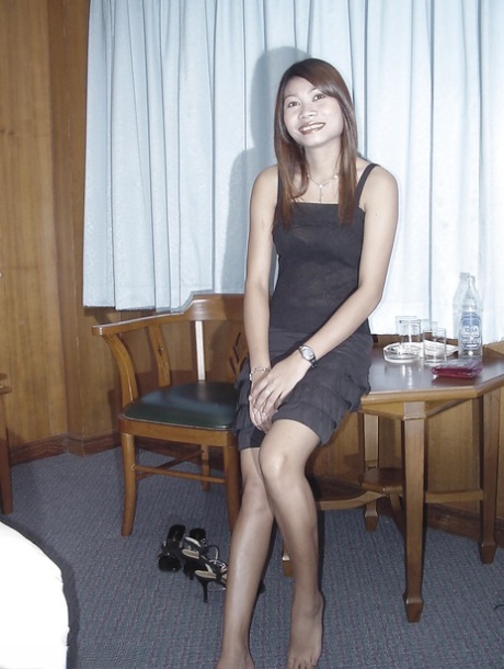 Brunette Asian babe Gulp is demonstrating her small boobies