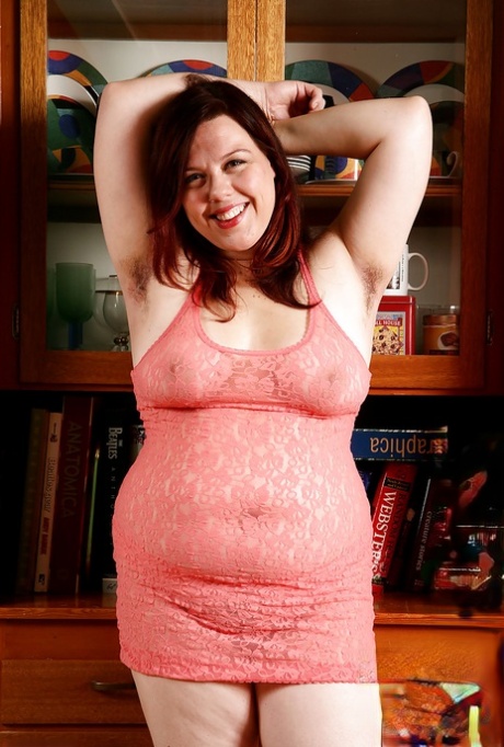 Aged fatty shows off furry armpits before spreading hairy vagina