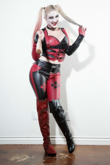 Blonde babe in a costume Leya Falcon shows her boobs in a solo show