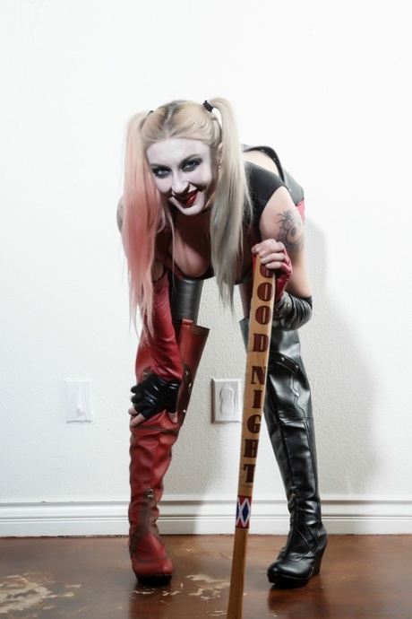 Blonde babe in a costume Leya Falcon shows her boobs in a solo show