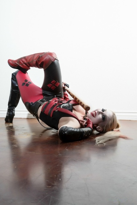 Blonde babe in a costume Leya Falcon shows her boobs in a solo show