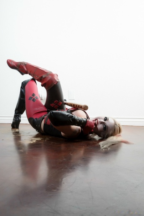 Blonde babe in a costume Leya Falcon shows her boobs in a solo show