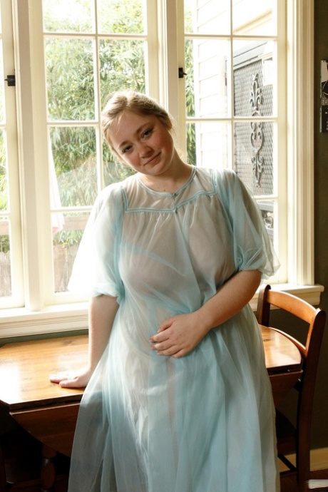 Adorable babe Rose Fessenden shows off her chubby body in see-through lingerie