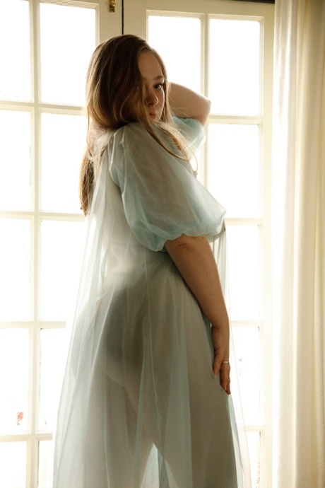 Adorable babe Rose Fessenden shows off her chubby body in see-through lingerie