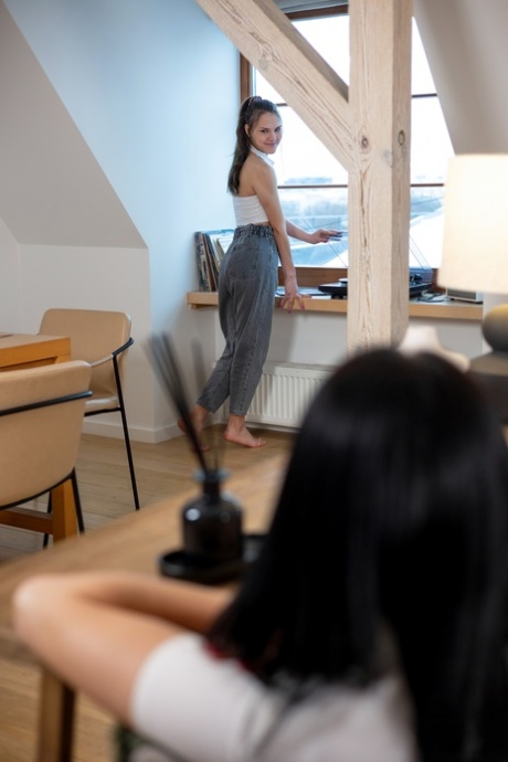 Skinny lesbian girlfriends Adrianna and Simon Kitty strip & fuck on the sofa