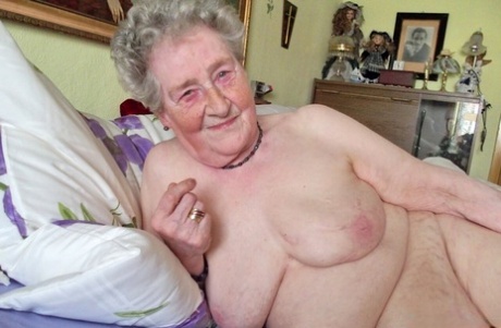 Curly-haired granny Pitschka flaunts her saggy tits in her compilation