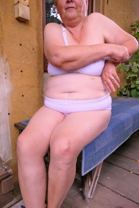 Granny Oma Geil washes her saggy tits and mature holes before getting dressed